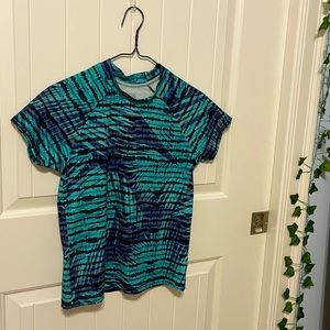 Teal and purple Athleta short sleeve rash guard